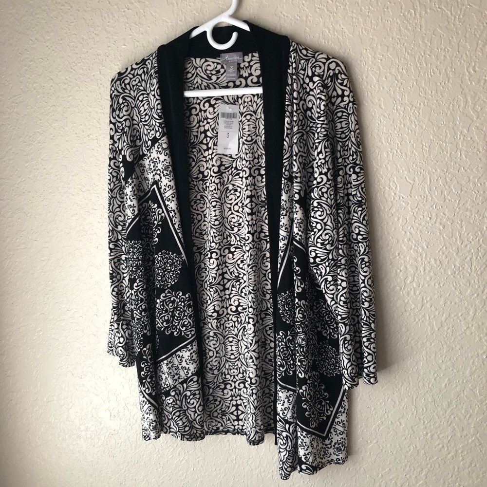 Chico’s NWT black/white cascade knit jacket.